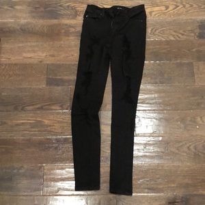 Size 24 black ripped jeans